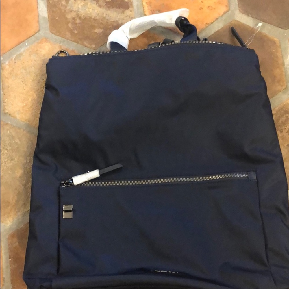 TUMI just Incase backpack